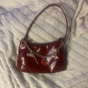 Juicy Couture Elegant Burgundy Shoulder Bag with Chain Accents